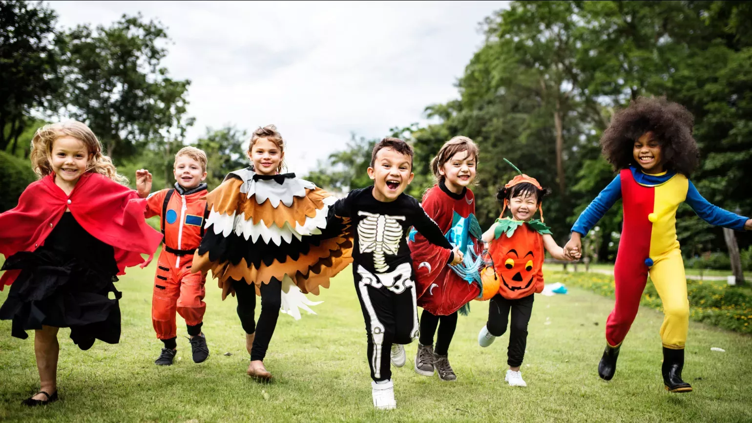 Halloween at Kew © RBG Kew A group of kids in Halloween costumes running through Kew Gardens