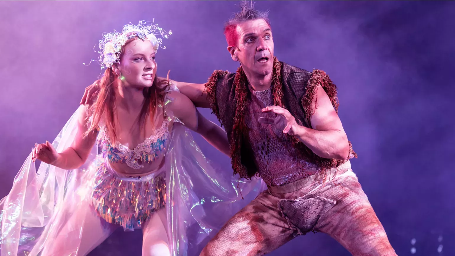 A Midsummer Night's Dream © Australian Shakespeare Company A person in colourful costume with a person in furs