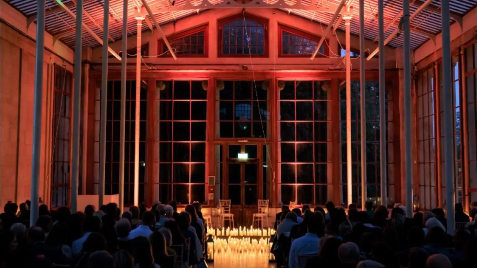 The Nash Sessions © Ollie Dixon A candlelit interior of a grand conservatory