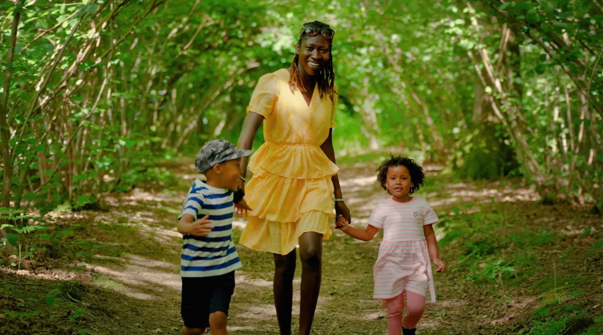 Families at Wakehurst, Visual Air © RBG Kew A family happily walk through a wooded area